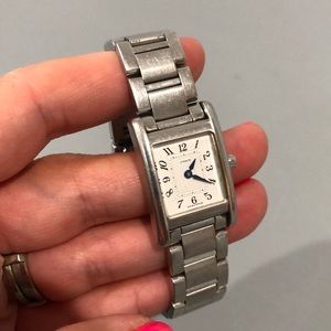 Coach stainless steel watch with blue dial hands